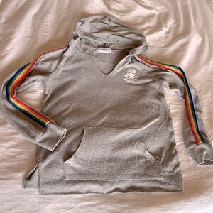 Soul Cycle hoodie with rainbow stiped arms